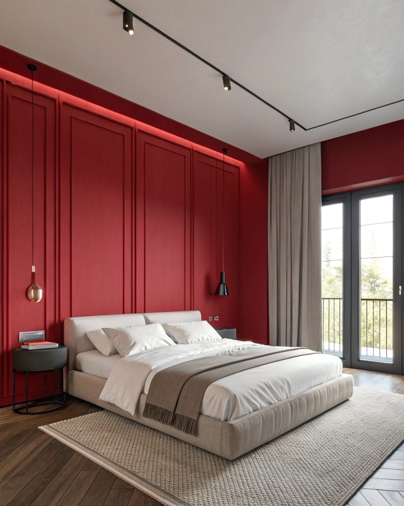 Chambre moderne avec murs rouges vifs et lit confortable.