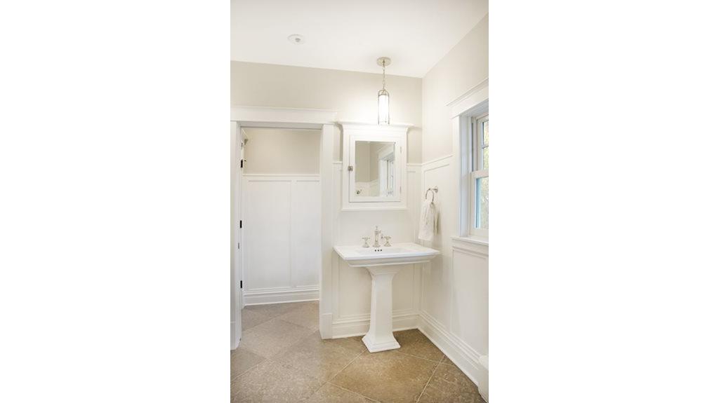 oversized travertine tiled bathroom
