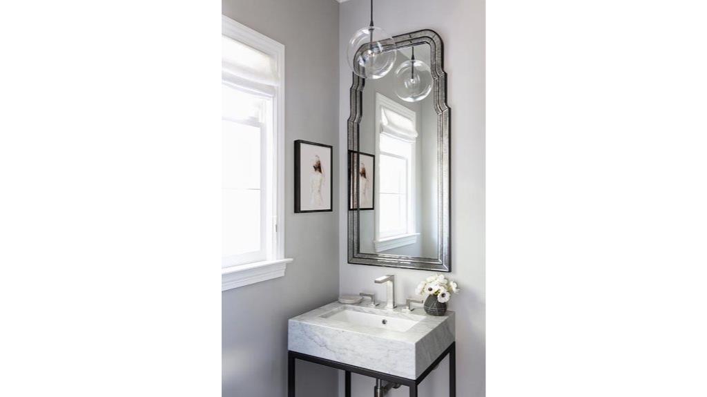 silver mirror with marble sink